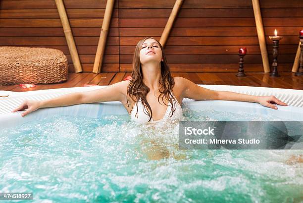 Woman Relaxing In A Beauty Farm Stock Photo - Download Image Now - Bathtub, Hydromassage, Whirlpool