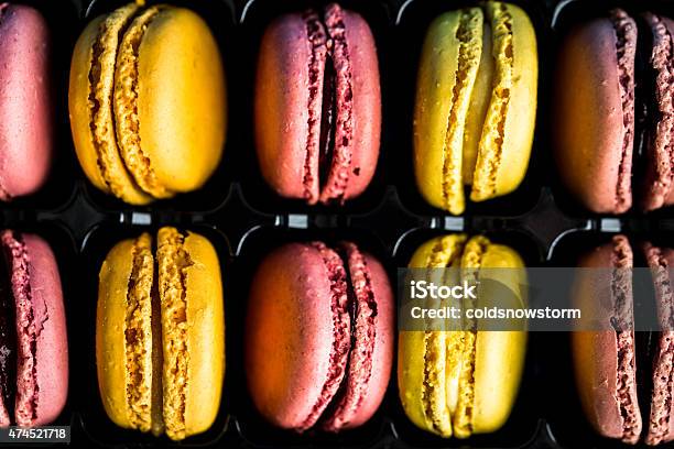 Brightly Coloured Macaroons In A Row Stock Photo - Download Image Now - 2015, Abstract, Backgrounds