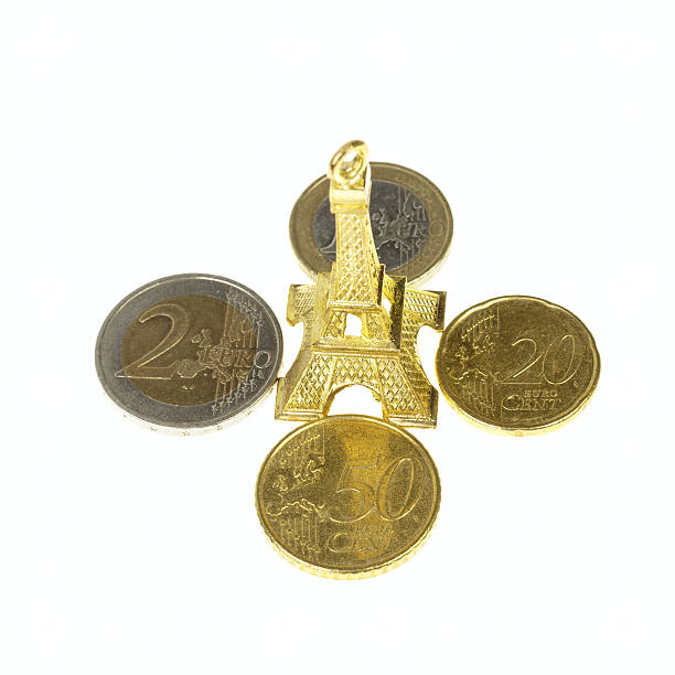 Eiffel tower on euro coins Eiffel tower on euro coins isolated on white background european union currency france number 50 coin stock pictures, royalty-free photos & images