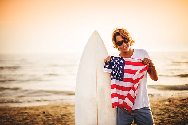 istock happiness american surfer at summer 474522605