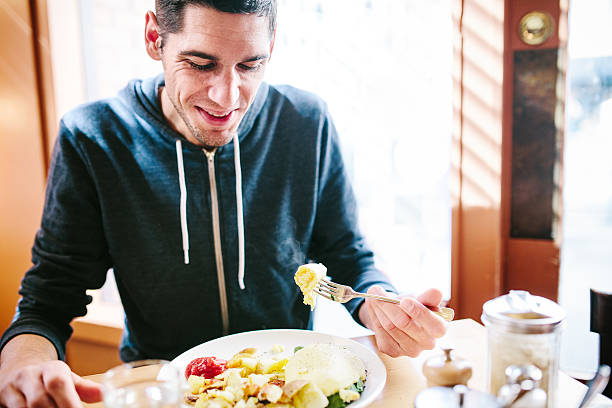 istock Man Eating Healthy Morning Breakfast 474522713