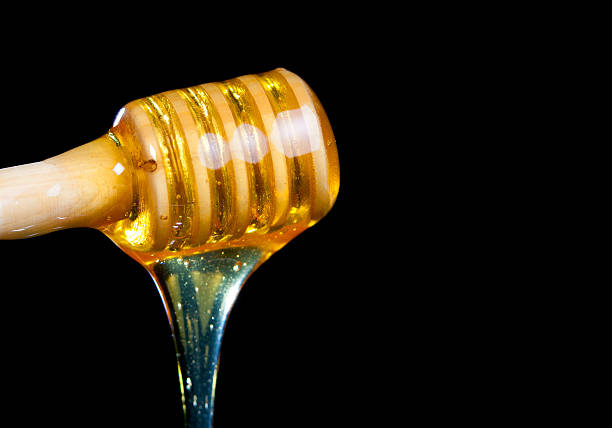 miele fresco honey.jh dripper - honey purity raw pollination foto e immagini stock