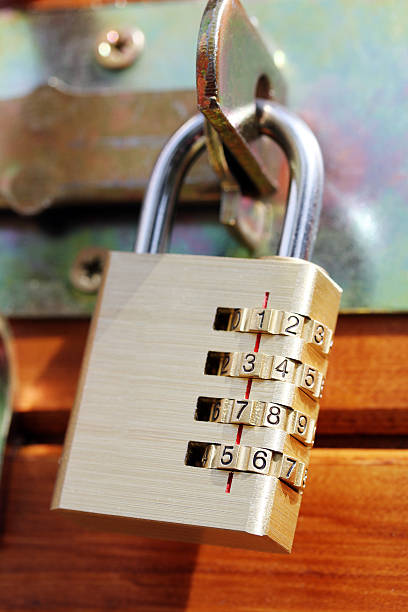 istock closed padlock on a wooden door 474530982