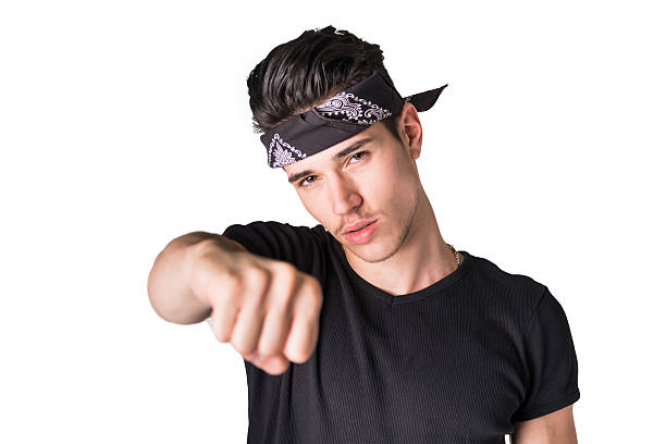 istock Handsome young man with headband, throwing punch 474544670