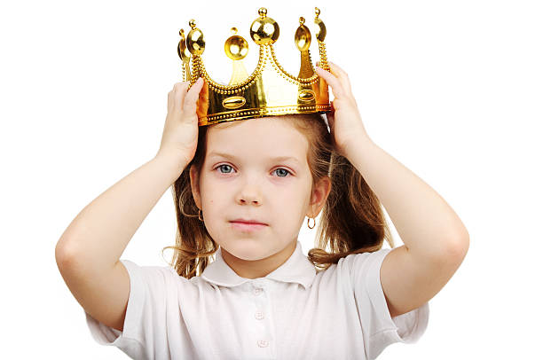 istock little girl wears a crown 474546035