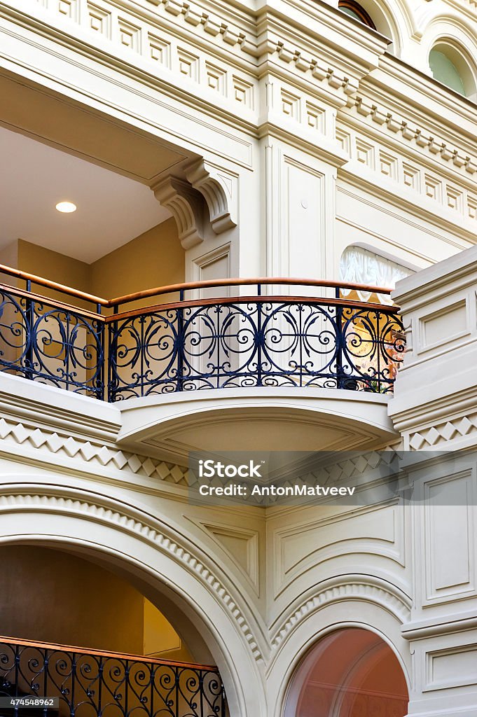 Classical balcony Balcony in classicism style of eighteenth century with curved arch and forged fence, architectural element  Accessibility Stock Photo