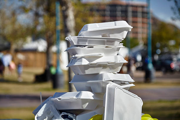 Styrofoam Food Containers White styrofoam used food containers stacked in trash can in park disposable stock pictures, royalty-free photos & images