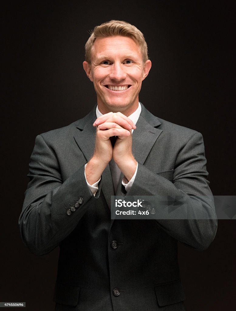 Businessman praying Businessman prayinghttp://www.twodozendesign.info/i/1.png 2015 Stock Photo