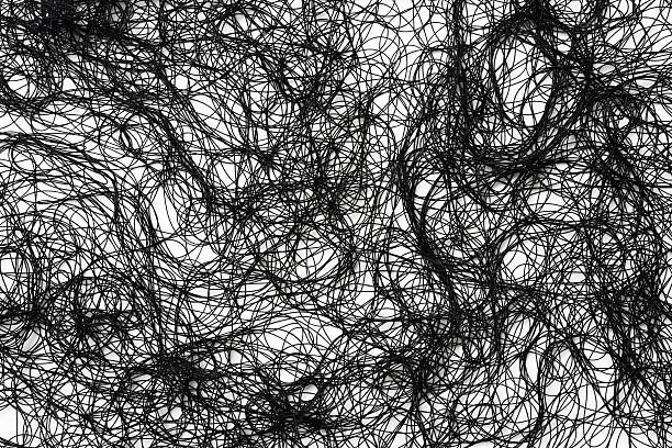 istock Isolated shot of black silk thread on white background 474551544