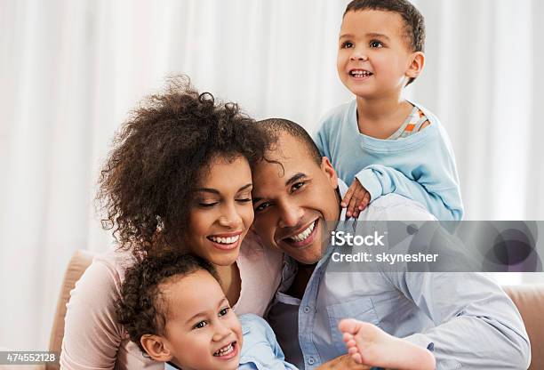 Portrait Of Cheerful African American Family At Home Stock Photo - Download Image Now