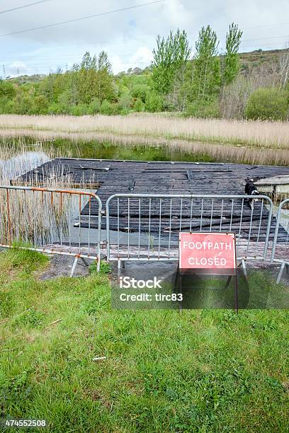 Footpath Closed Sign At Countryside Lake Walk Stock Photo - Download Image Now - 2015, Burnt, Closed