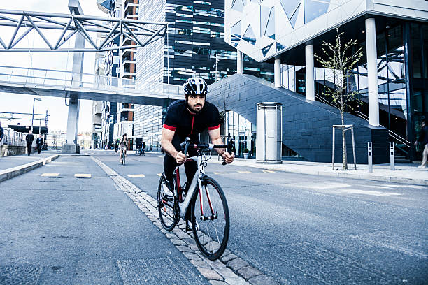 istock Commuter cycling fast at work in the morning 474552594