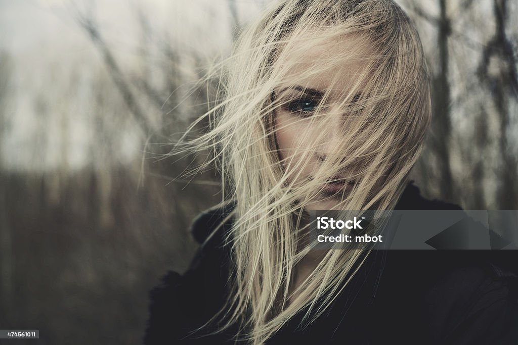 portrait of beautiful girl on windy day portrait of a beautiful girl on windy day Fear Stock Photo