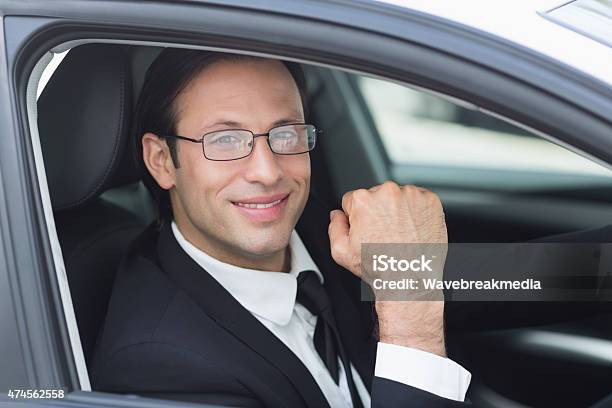 Happy Businessman In The Drivers Seat Stock Photo - Download Image Now - 2015, 30-34 Years, 30-39 Years