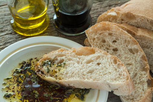 Sliced Ciabatta bread with olive oil and balsamic vinegar.