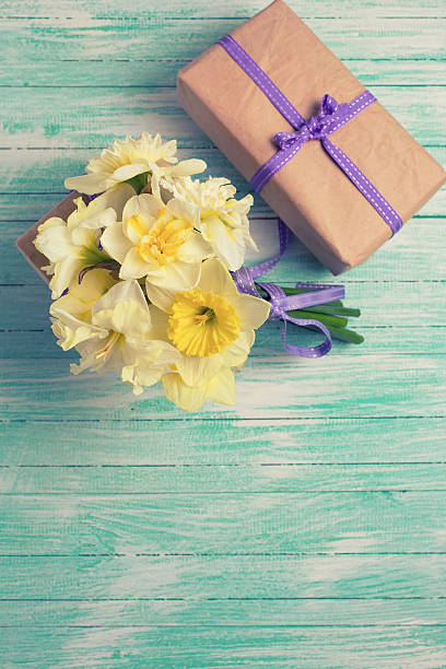 istock Bunch of fresh  spring  flowers and gift box 474563566