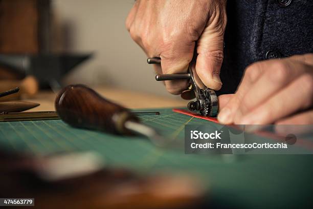 Artisan Working With Leather Stock Photo - Download Image Now - 30-39 Years, 40-49 Years, 50-59 Years