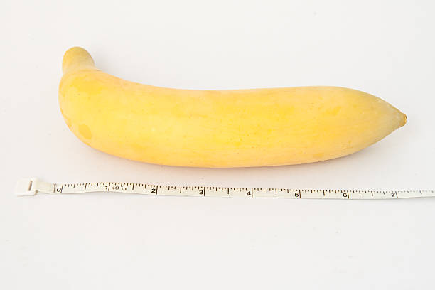 duże banana i taśma pomiarowa - decimeter zdjęcia i obrazy z banku zdjęć