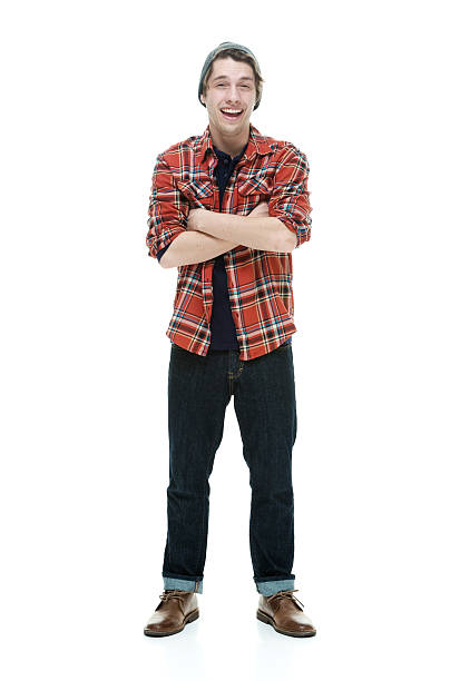 istock Smiling hipster standing with arms crossed 474564392