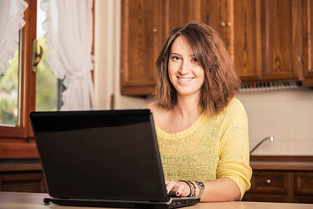 istock Young woman studying at home 474564883