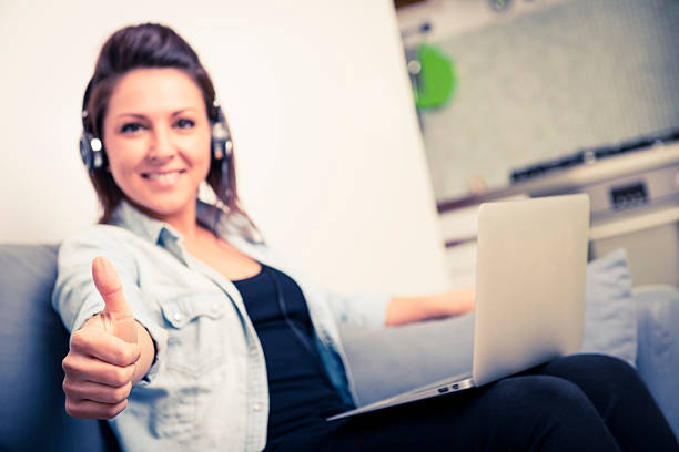 istock Attractive woman working on her laptop 474565121