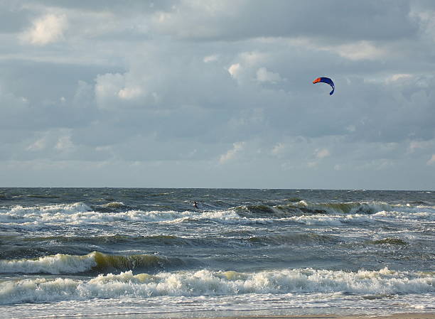 kite surfer at sea in time of storm