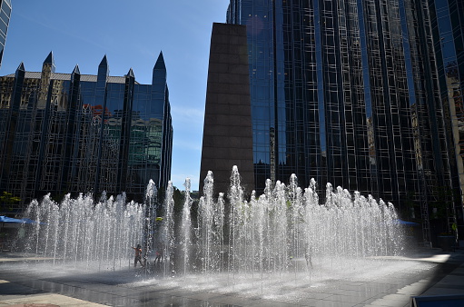 Close-up of a fountain's vigorous water spray, capturing the dynamic movement and the power of water