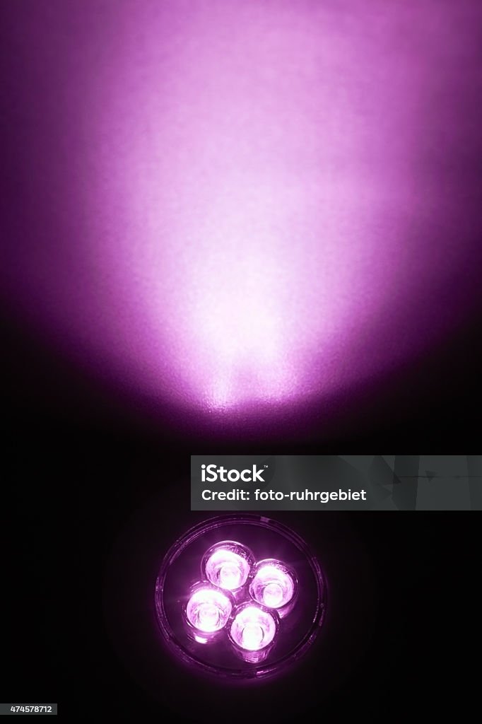 Leds Bright LEDs shine on a surface in the foreground. 2015 Stock Photo