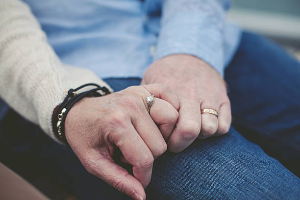 istock Woman and Man Smiling and Hugging 474586162