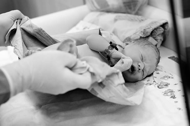 istock Newborn baby right after delivery 474586360