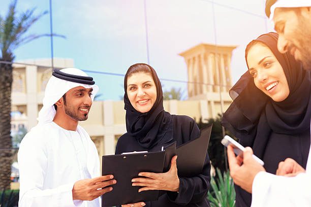 istock Four arab business people outside 474586436