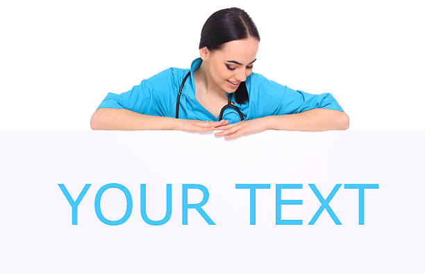 istock Medical doctor woman show empty blank 474587144