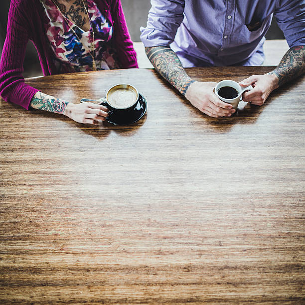 An overhead view of a man and woman with arm \