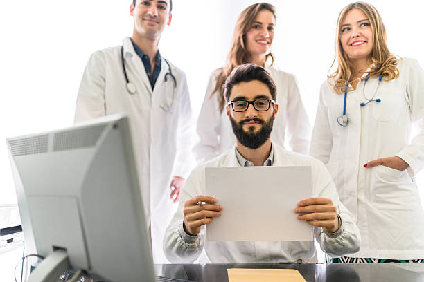 istock Teamwork of doctors in the office for a meeting 474590554