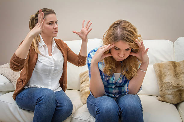 istock Furious mother arguing with her ​​teenage daughter 474593521