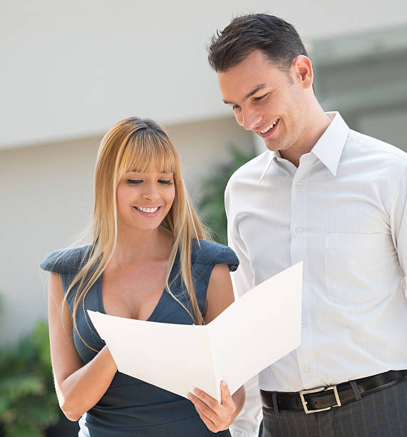 istock Business couple working together 474599690