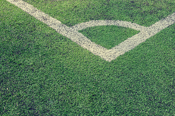 istock Artificial turf soccer field, a corner marker line 474600032