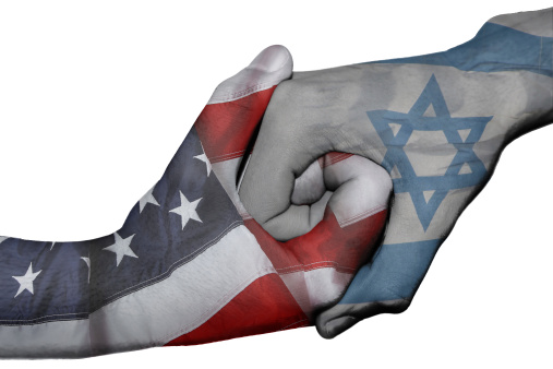 Diplomatic handshake between countries: flags of United States and Israel overprinted the two hands