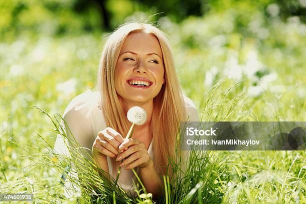 Girl With Dandelion Stock Photo - Download Image Now - Adult, Adults Only, Beautiful People