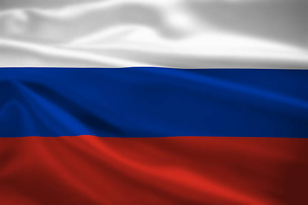 Russia flag blowing in the wind stock photo