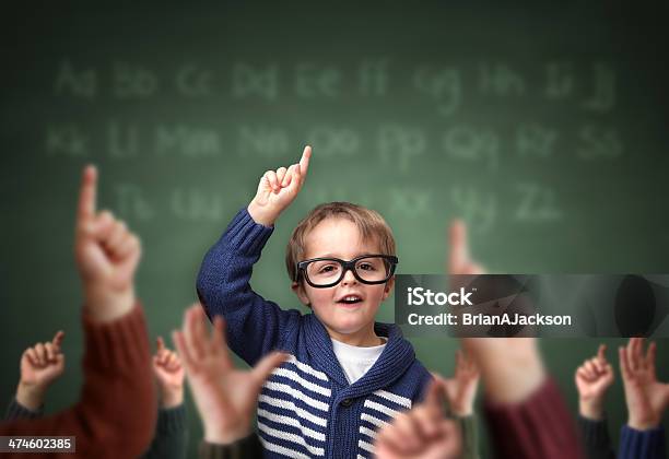 Standing Out From The Crowd At School Stock Photo - Download Image Now - Child, Leadership, Hand Raised