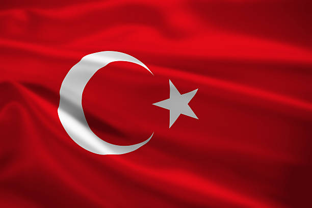 turquía bandera soplando en el viento - bandera turca fotografías e imágenes de stock