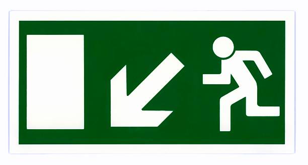 Emergency exit sign Emergency exit sign isolated on white with clipping path. Photo based, not an illustration. emergency exit photos stock pictures, royalty-free photos & images