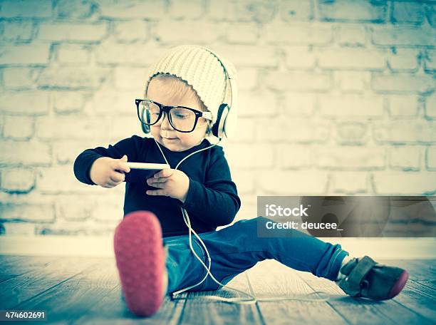 Little Nerd With Music Player Stock Photo - Download Image Now - 18-23 Months, Babies Only, Baby - Human Age