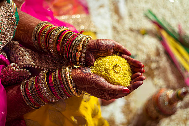 Indian bride performing rituals Shot in a Indian wedding ceremonial dancing stock pictures, royalty-free photos & images
