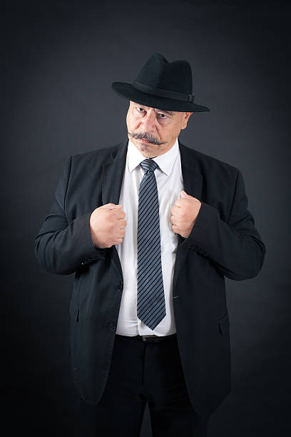 istock Handsome man doing different expressions in different sets of clothes 474605962