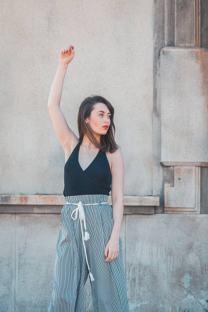 istock Beautiful brunette posing in an industrial context 474609806