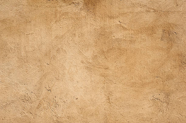 istock Texture of old wall covered with gray stucco 474612542
