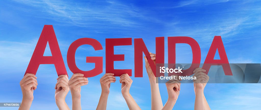 Hands Holding Red Straight Word Agenda Blue Sky Many Caucasian People And Hands Holding Red Straight Letters Or Characters Building The English Word Agenda On Blue Sky 2015 Stock Photo