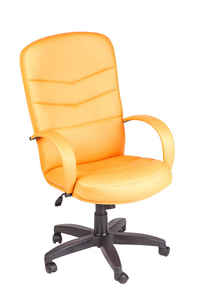 istock The office chair from yellow leather. Isolated 474616738